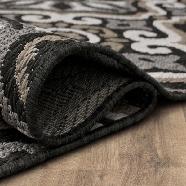 https://www.karastanrugs.com/cdn/shop/products/PortugalTile_Charcoal_92312E307063090_Roll_Tiny_600x.jpg?v=1632153858